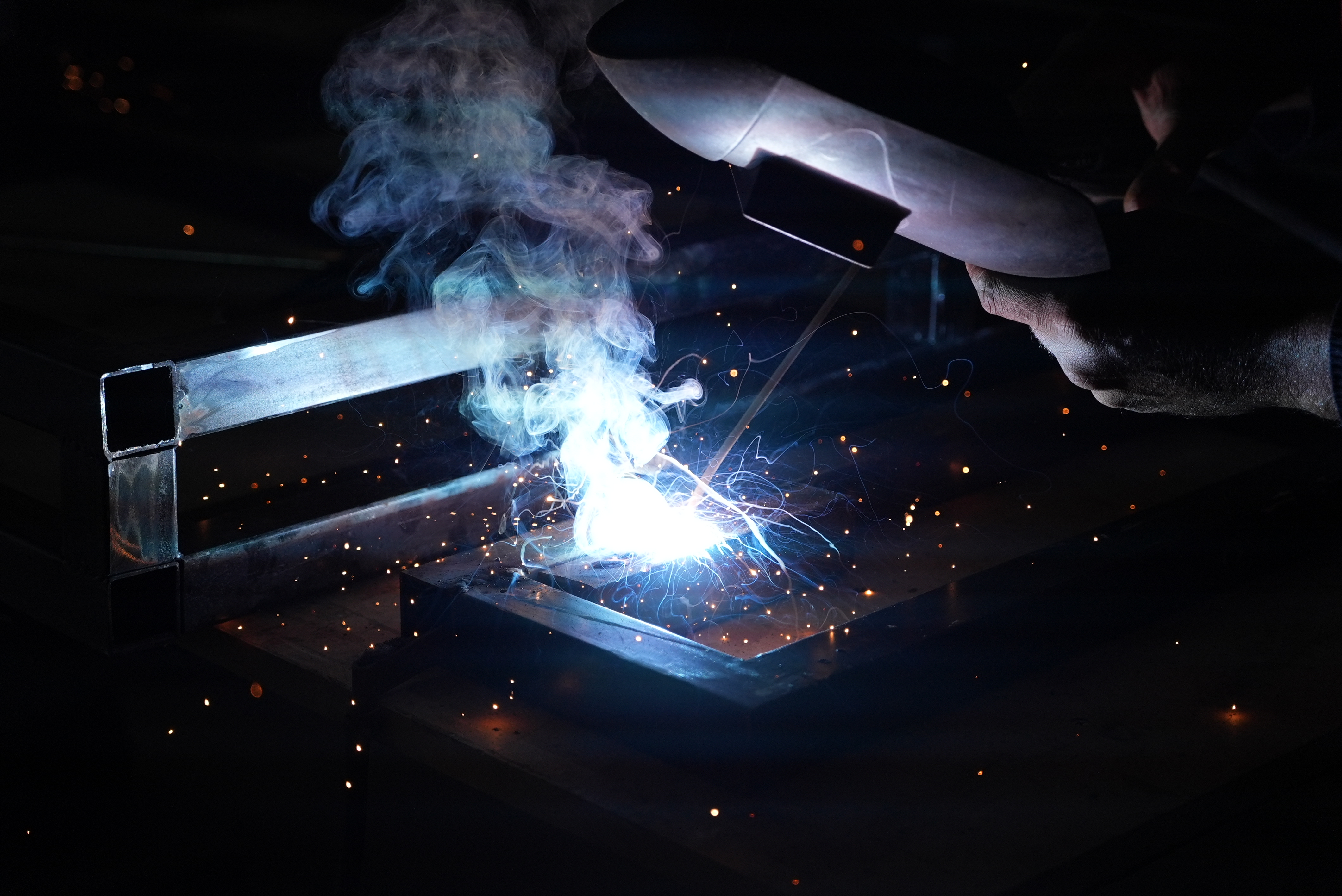 Blueline craftsman at work — precision welding in the production facility
